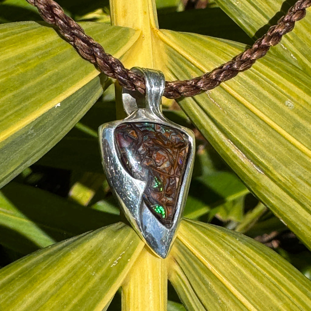 handcrafted Australian boulder opal pendant with emerald vein patterns