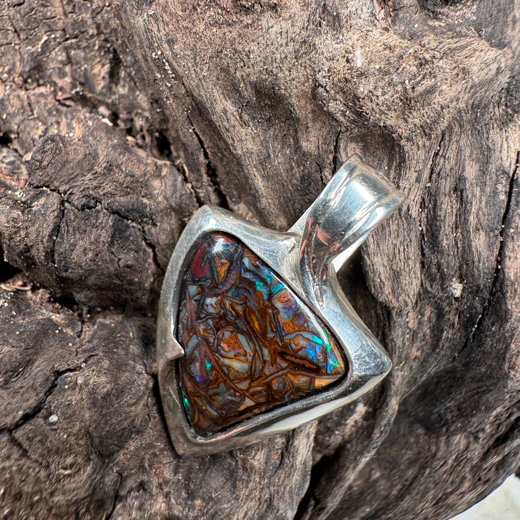 boulder opal pendant with natural green vein patterns