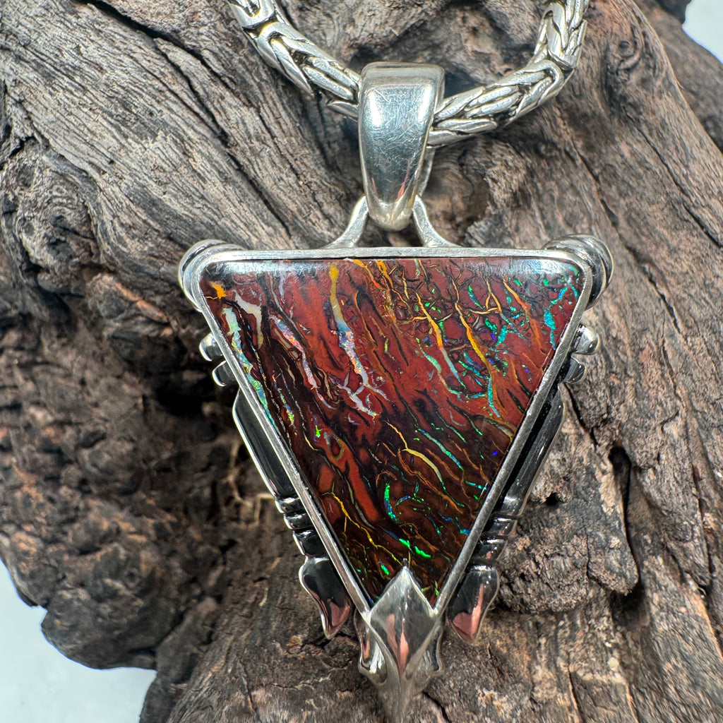 reversible trident pendant with vibrant opal colors inspired by sea waves