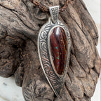 Tidal Koru Relic Boulder Opal Pendant, a one-of-a-kind boulder opal pendant inspired by the ancient Koru symbol of renewal, growth, and eternal movement.