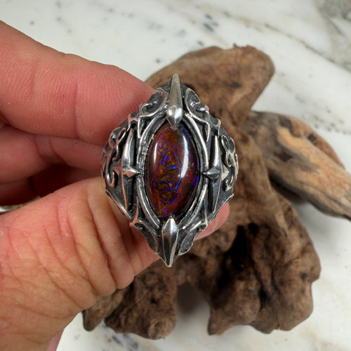 Guardian Relic handmade .950 silver ring featuring a natural blue-violet Australian Boulder opal