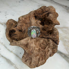 Sunlit Lagoon handcrafted Australian Coober Pedy opal ring in .925 sterling silver with a 14K gold rope bezel accent and gold accent ball.