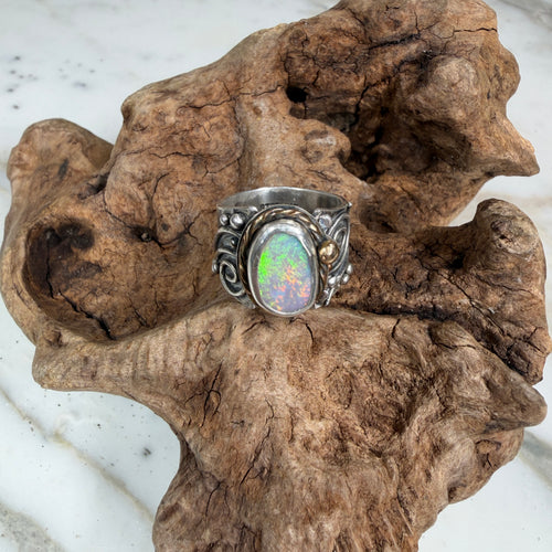 Sunlit Lagoon handcrafted Australian Coober Pedy opal ring in .925 sterling silver with a 14K gold rope bezel accent and gold accent ball.