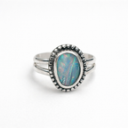 Silver ring with an oval opal stone