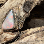 Celestial Tide handcrafted Australian crystal opal ring in .925 sterling silver with a 14K gold rope bezel, gold accents, and sculpted starfish.