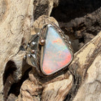 Celestial Tide handcrafted Australian crystal opal ring in .925 sterling silver with a 14K gold rope bezel, gold accents, and sculpted starfish.