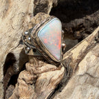 Celestial Tide handcrafted Australian crystal opal ring in .925 sterling silver with a 14K gold rope bezel, gold accents, and sculpted starfish.