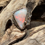 Celestial Tide handcrafted Australian crystal opal ring in .925 sterling silver with a 14K gold rope bezel, gold accents, and sculpted starfish.