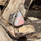 Celestial Tide handcrafted Australian crystal opal ring in .925 sterling silver with a 14K gold rope bezel, gold accents, and sculpted starfish.
