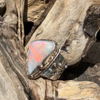 Celestial Tide handcrafted Australian crystal opal ring in .925 sterling silver with a 14K gold rope bezel, gold accents, and sculpted starfish.