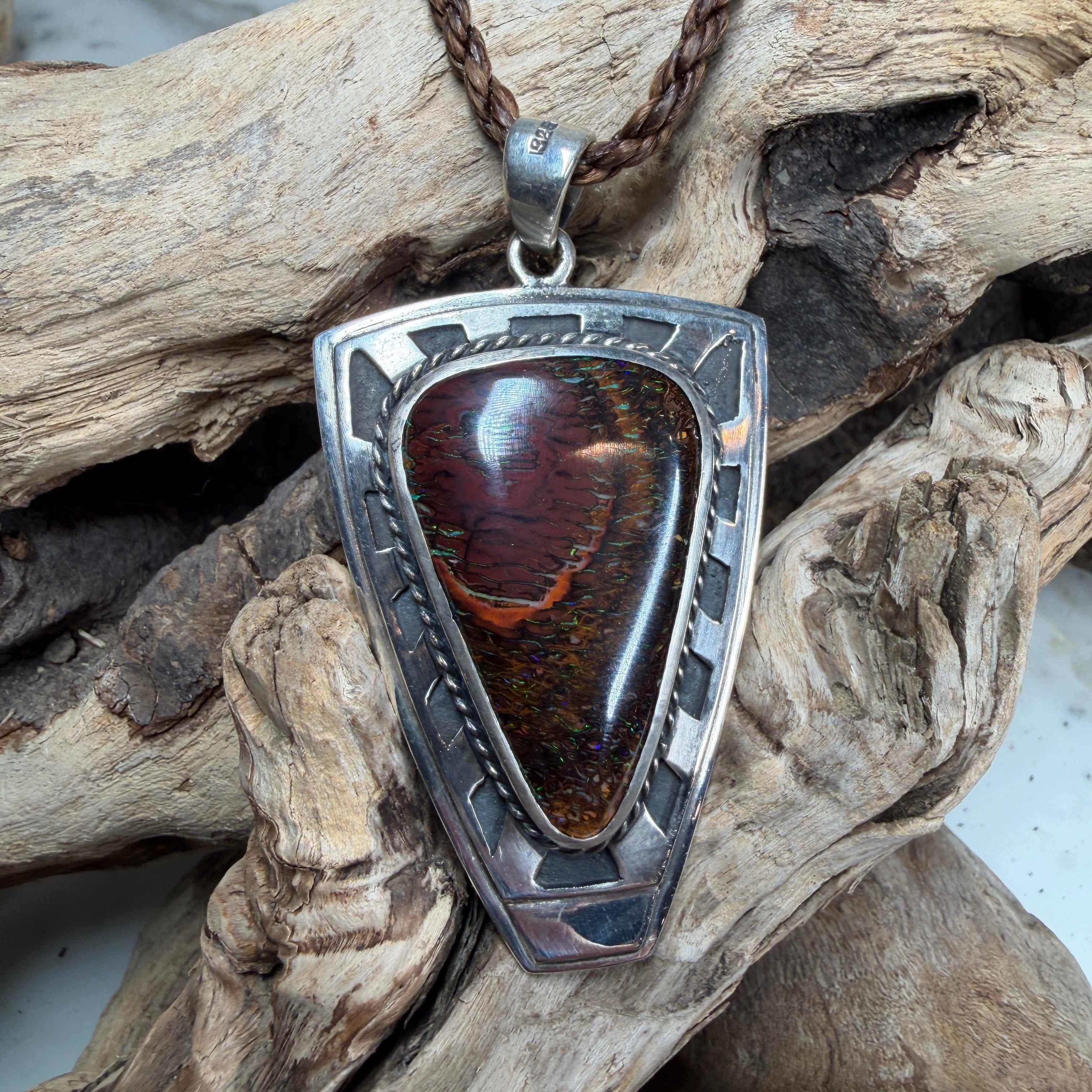 Luxury TIDAL OPALS Iron Bastion pendant crafted in solid .925 sterling silver with a unique natural Koroit Boulder Opal.