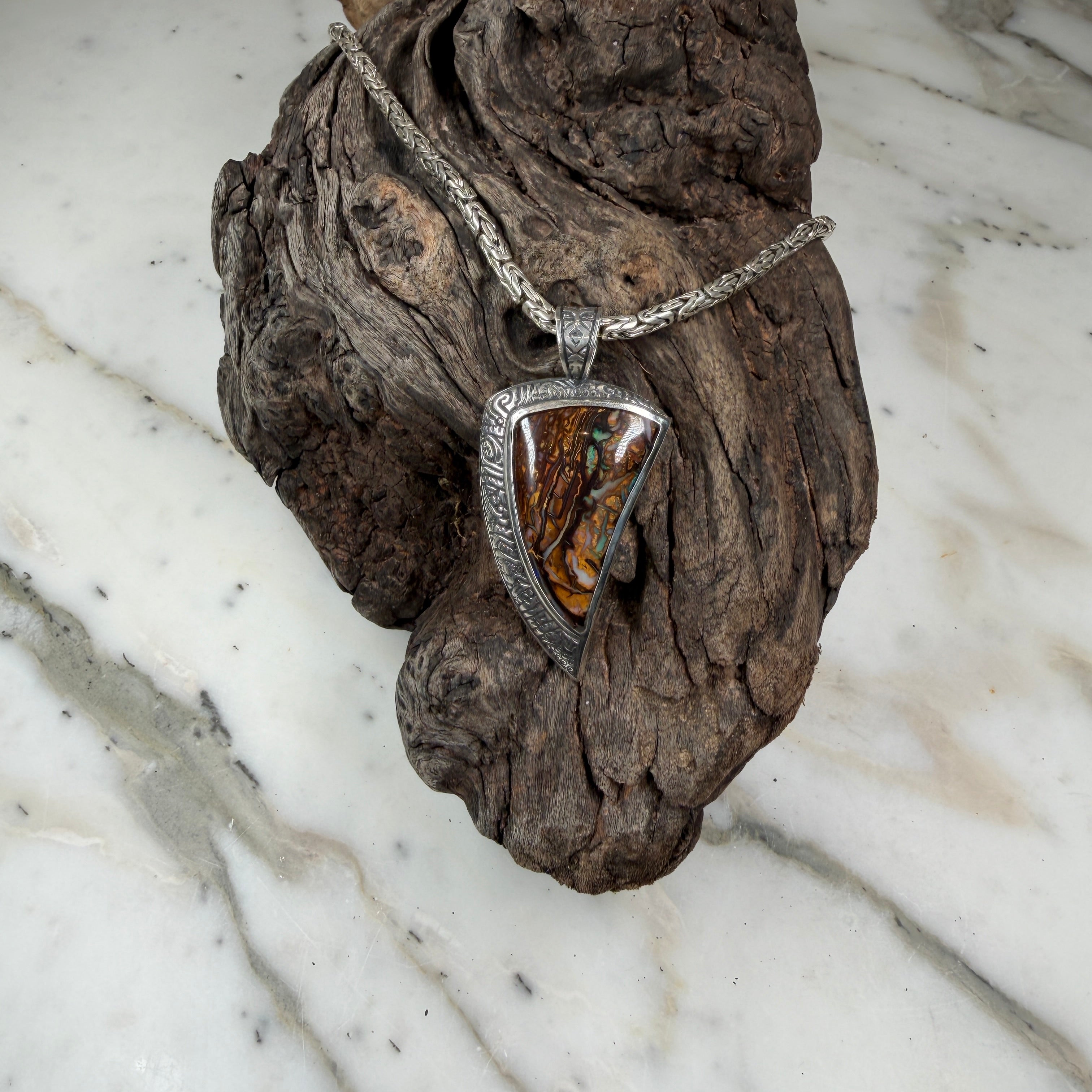 Veins of Papatūānuku Boulder Opal Pendant
