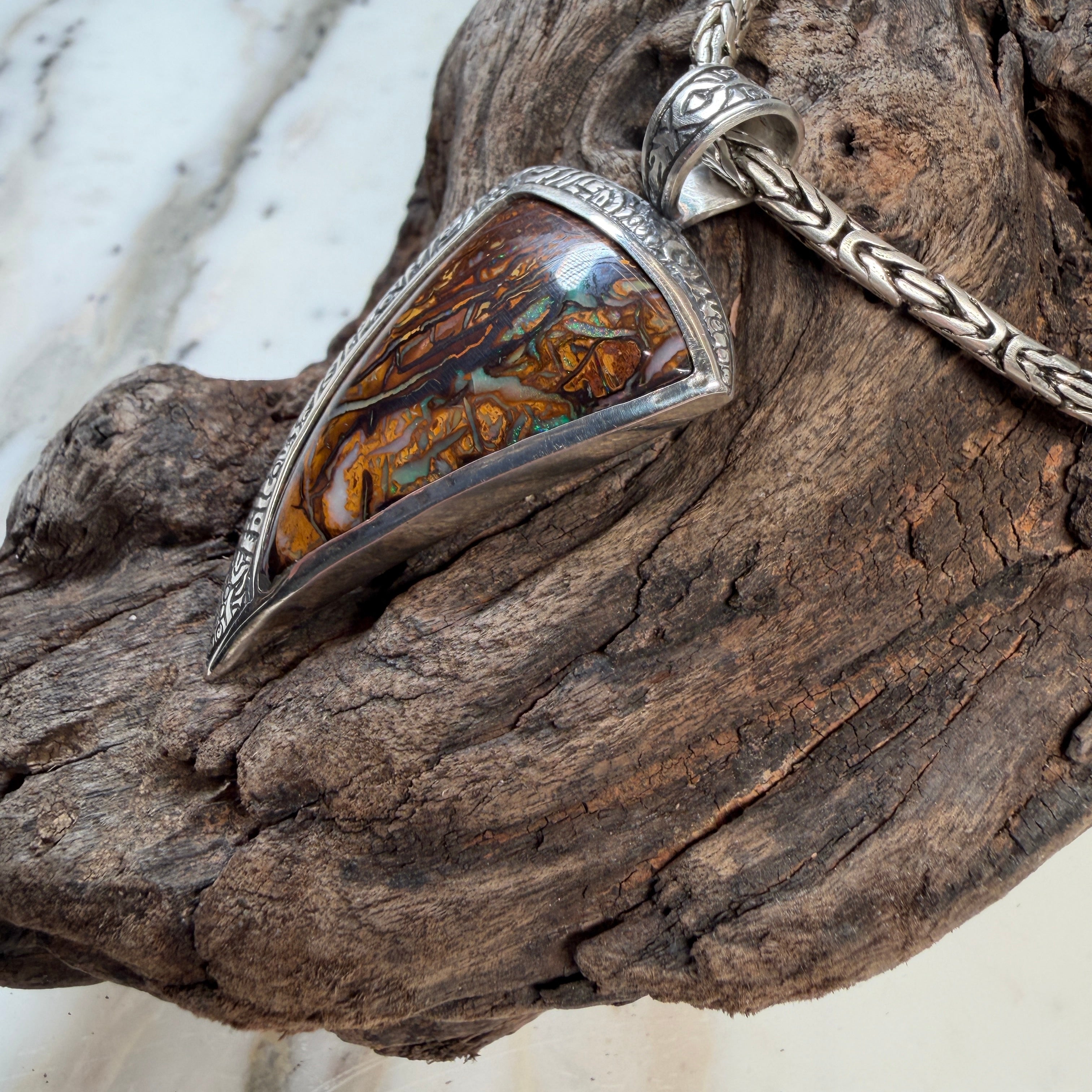 The Veins of Papatūānuku Boulder Opal Pendant 