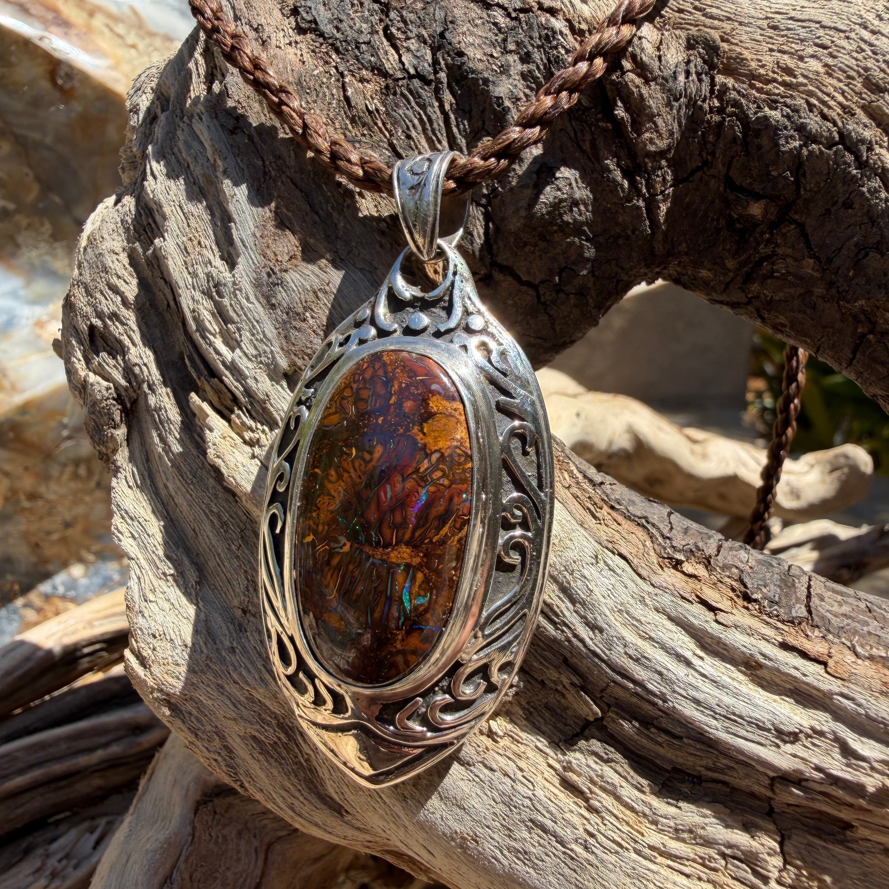 Handcrafted sterling silver Australian Boulder Opal pendant