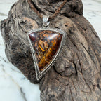 Artisan sterling silver pendant featuring a unique Australian Boulder Opal with rich chocolate brown and bronze tones.