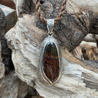 Kaiara ocean-inspired pendant with Australian Boulder Opal gemstone and flowing engraved silver details.