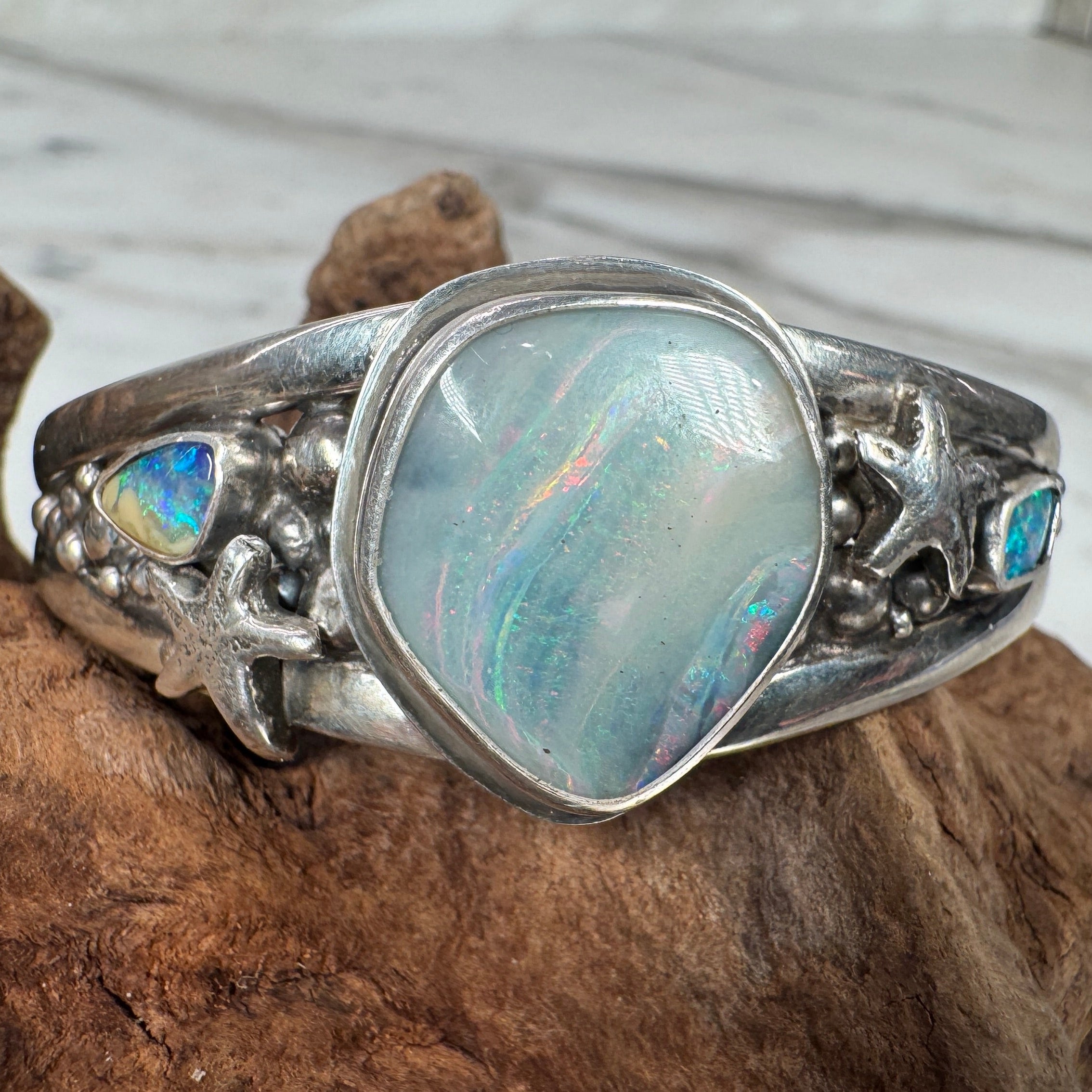Ocean Inspired Australian Boulder Opal Cuff with Accent Opals + Starfish