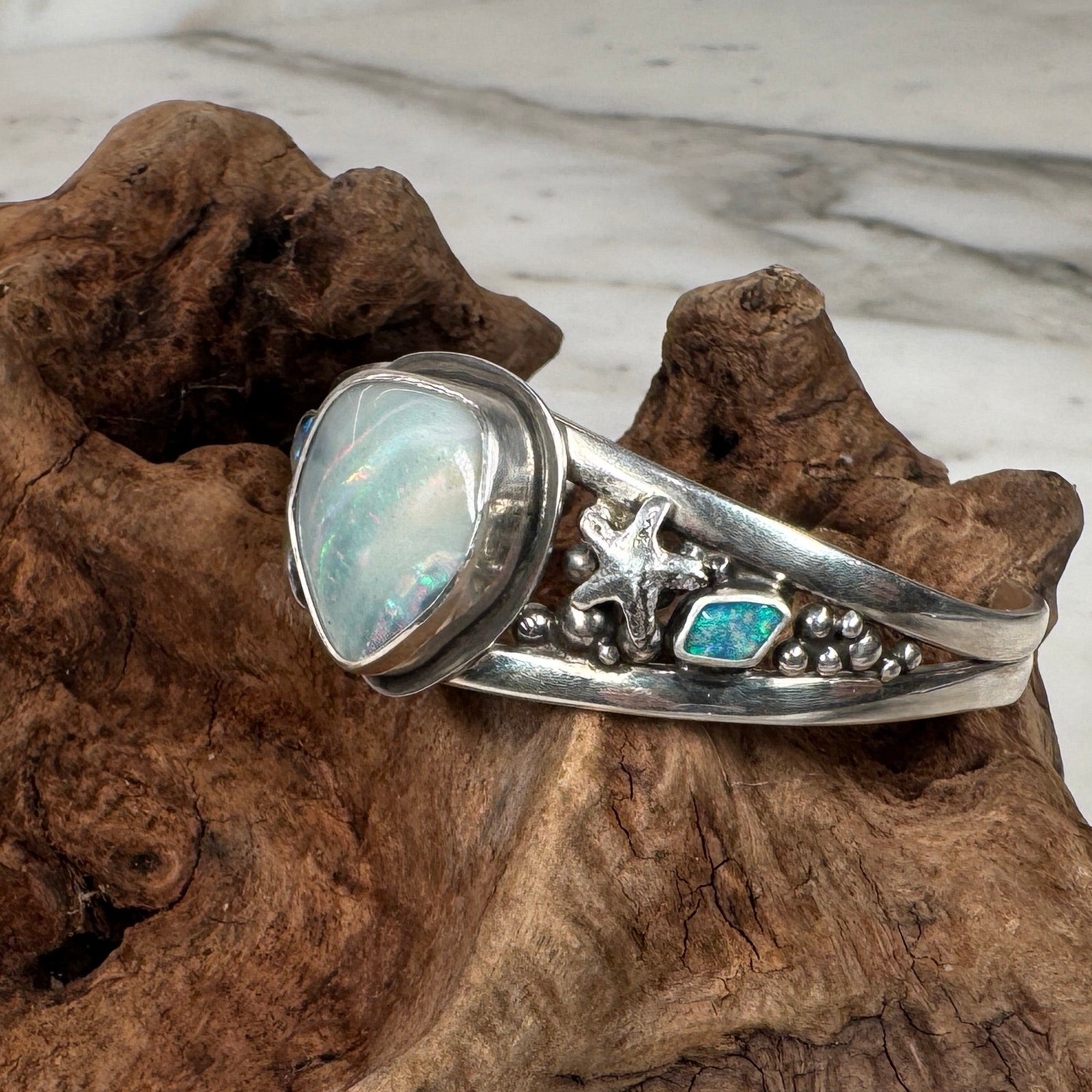 Ocean Inspired Australian Boulder Opal Cuff with Accent Opals + Starfish