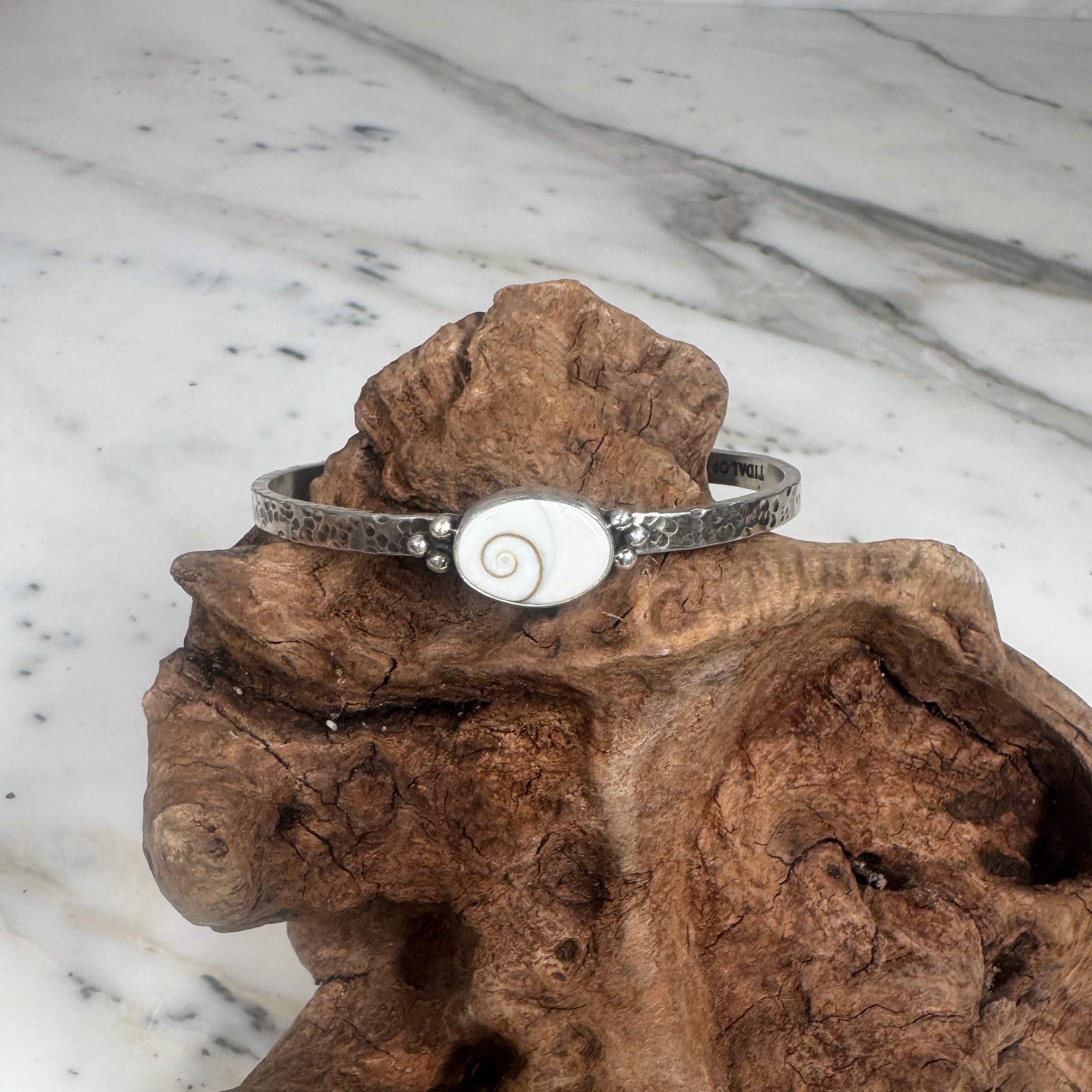 Sacred Spiral Oval Shiva Shell Cuff