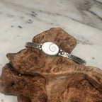 Sacred Spiral Oval Shiva Shell Cuff