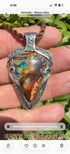 Ocean Current one-of-a-kind Australian Boulder Opal pendant handcrafted in solid .950 silver featuring vivid turquoise, blue, green, orange, gold, and natural Australian ironstone.