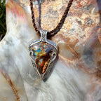 Ocean Current one-of-a-kind Australian Boulder Opal pendant handcrafted in solid .950 silver featuring vivid turquoise, blue, green, orange, gold, and natural Australian ironstone.