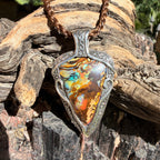 Ocean Current one-of-a-kind Australian Boulder Opal pendant handcrafted in solid .950 silver featuring vivid turquoise, blue, green, orange, gold, and natural Australian ironstone.