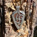 Ocean Current one-of-a-kind Australian Boulder Opal pendant handcrafted in solid .950 silver featuring vivid turquoise, blue, green, orange, gold, and natural Australian ironstone.
