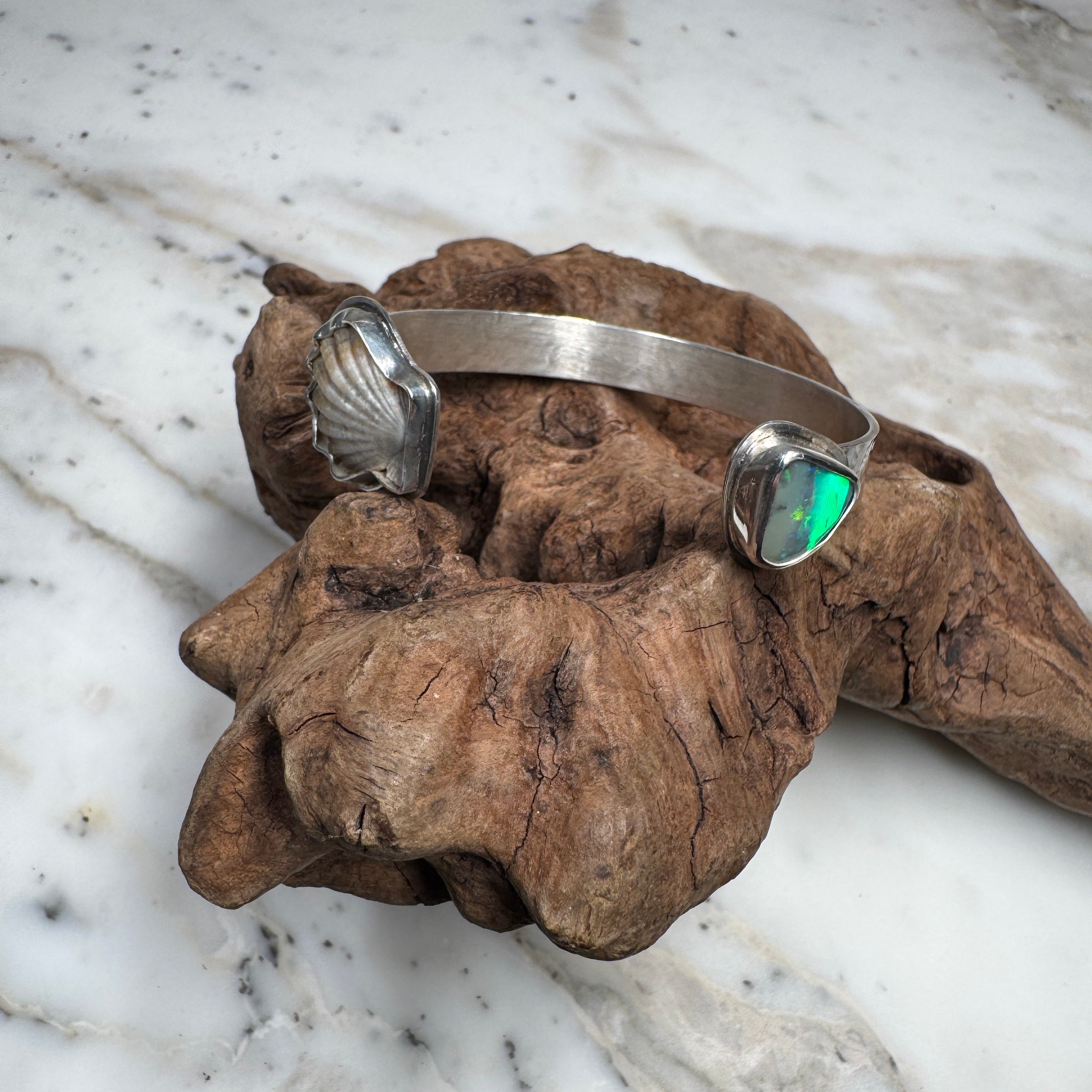 Emerald Tide Boulder Opal with Sunrise Seashell Cuff