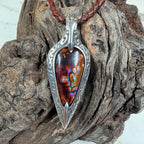 Ember Relic one-of-a-kind Australian boulder opal pendant with electric blue, orange and red color set in engraved sterling silver.