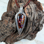 Ember Relic one-of-a-kind Australian boulder opal pendant with electric blue, orange and red color set in engraved sterling silver.