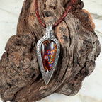 Ember Relic one-of-a-kind Australian boulder opal pendant with electric blue, orange and red color set in engraved sterling silver.