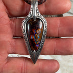 Ember Relic one-of-a-kind Australian boulder opal pendant with electric blue, orange and red color set in engraved sterling silver.