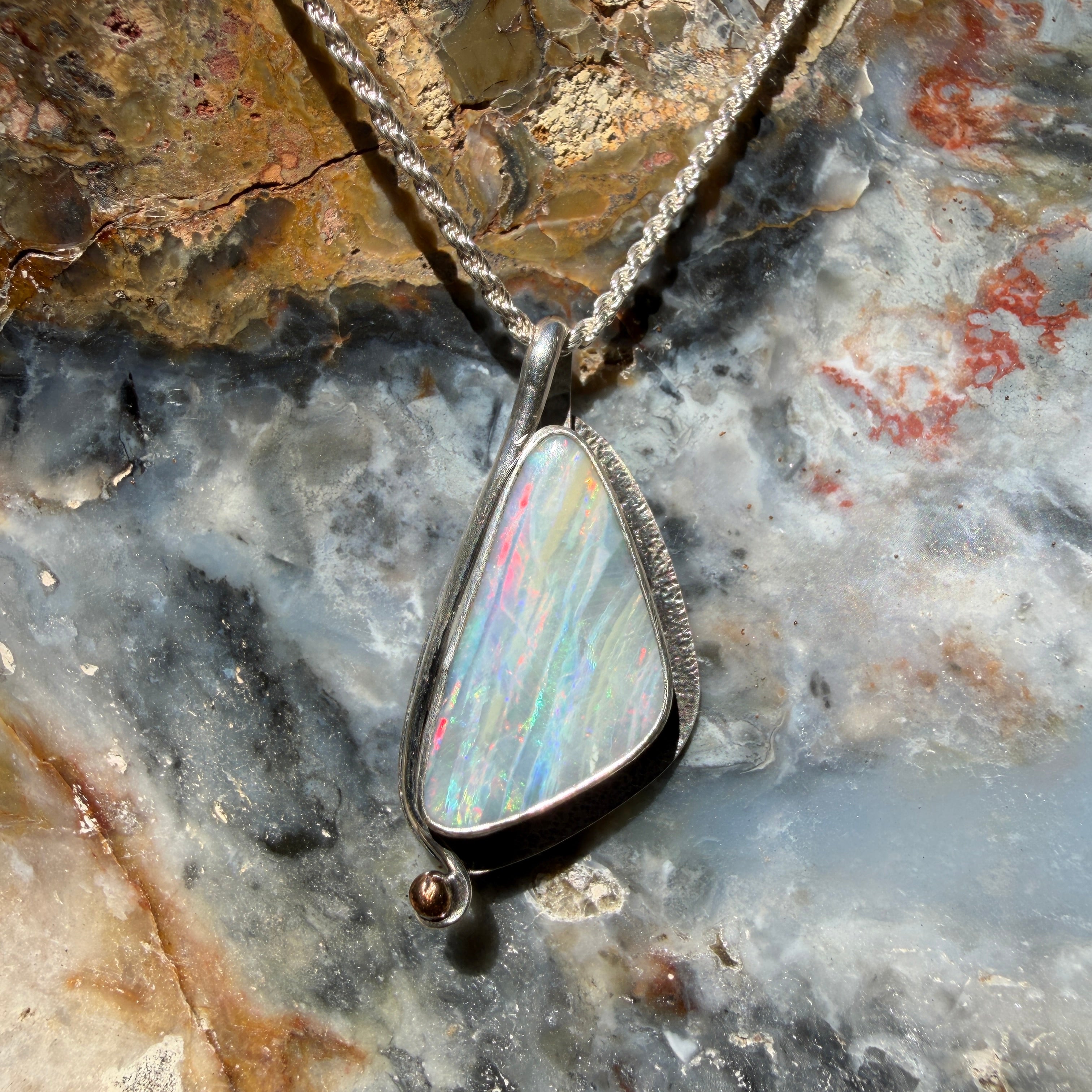 Artisan handcrafted Australian Boulder Opal pendant in .925 sterling silver
