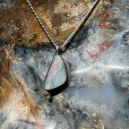 Fine jewelry pendant featuring a 24 × 12 mm genuine Australian Boulder Opal