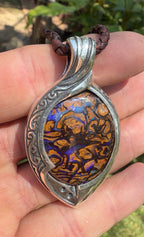 Electric blue Australian boulder opal pendant in handcrafted sterling silver