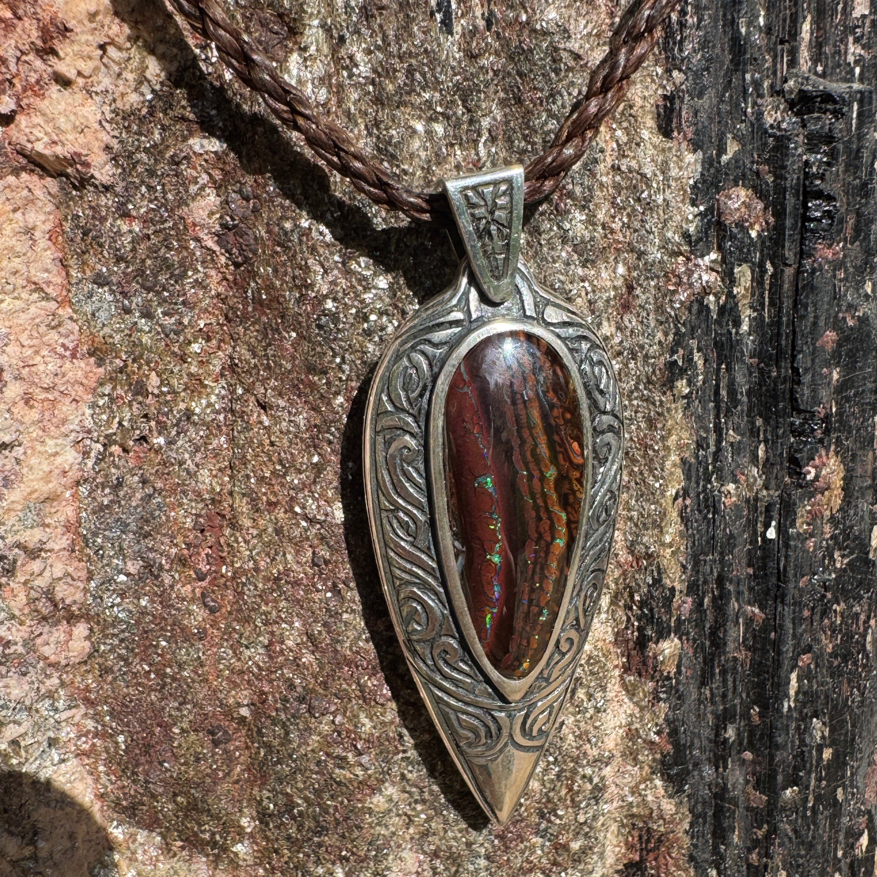 Get Tidal Koru Relic Boulder Opal Pendant