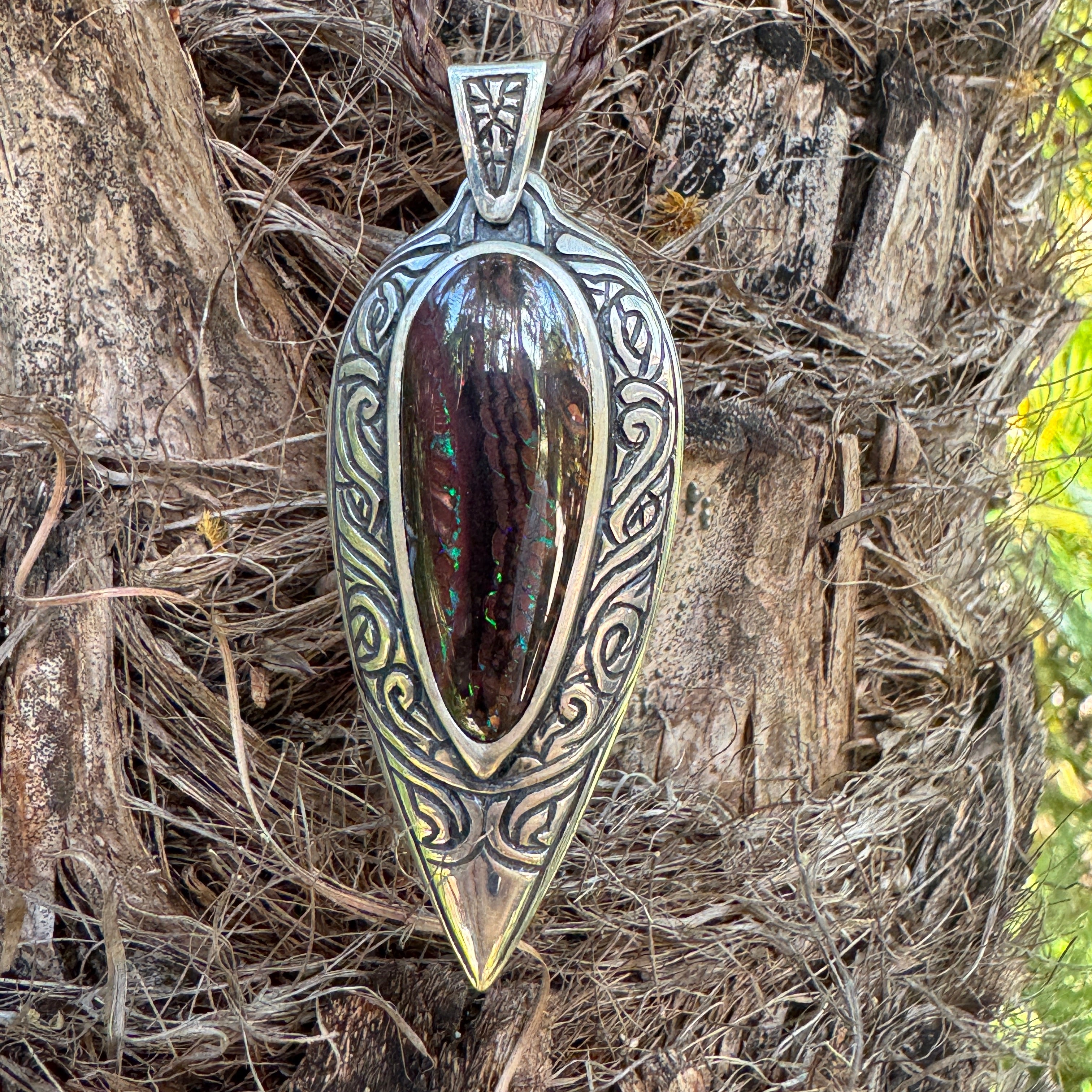 Buy Tidal Koru Relic Boulder Opal Pendant