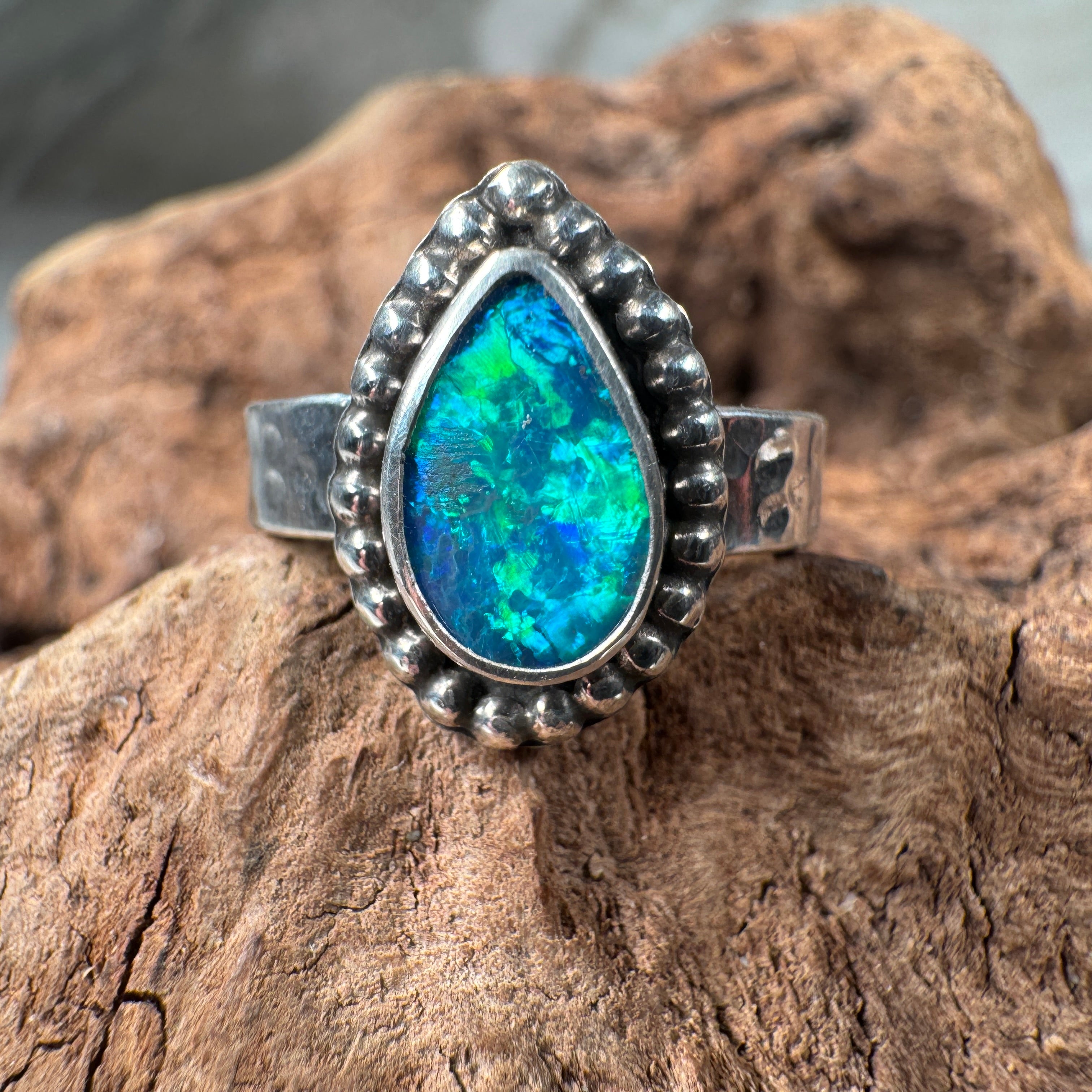 Silver ring with a blue opal stone 