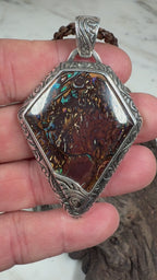 Ancient Veil is a one-of-a-kind Australian Boulder Opal pendant